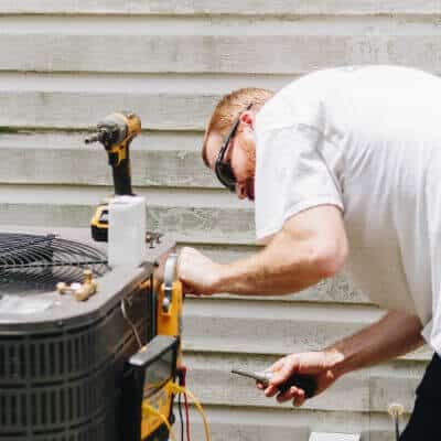 Technician With Hvac Condensor